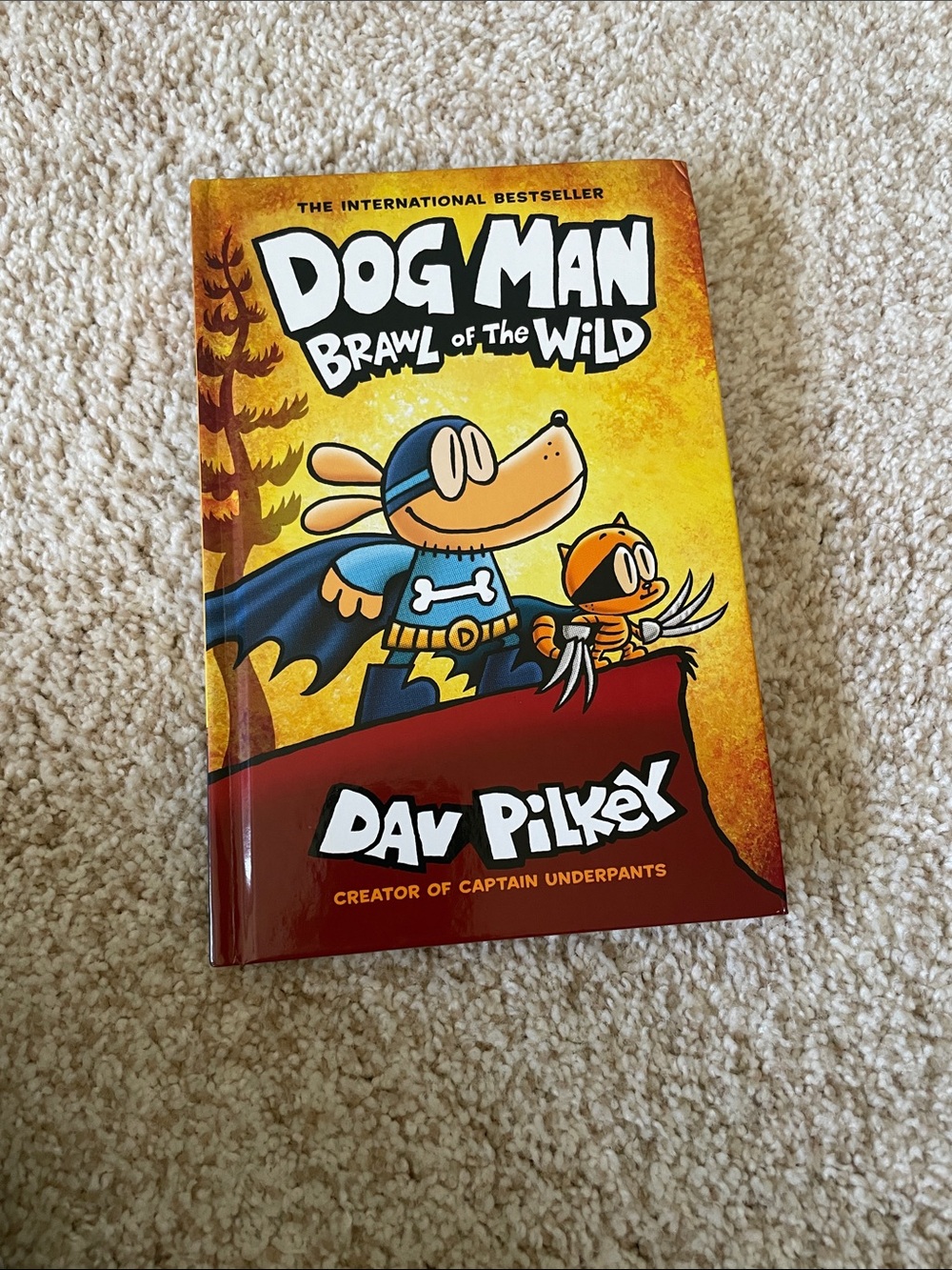 Dog Man Brawl of the Wild Hardcover - Yellow/Red Cover by